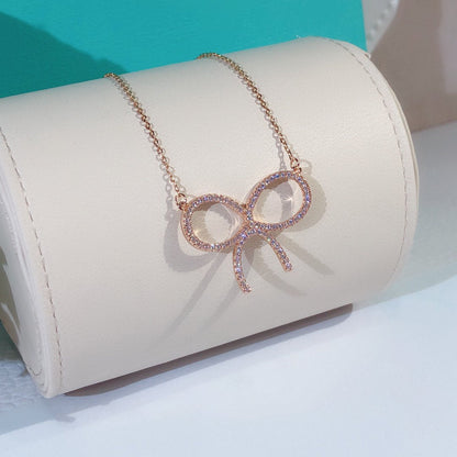 [Lumi Jewelry]CLAW SET RHODIUM PLATED BOW NECKLACE