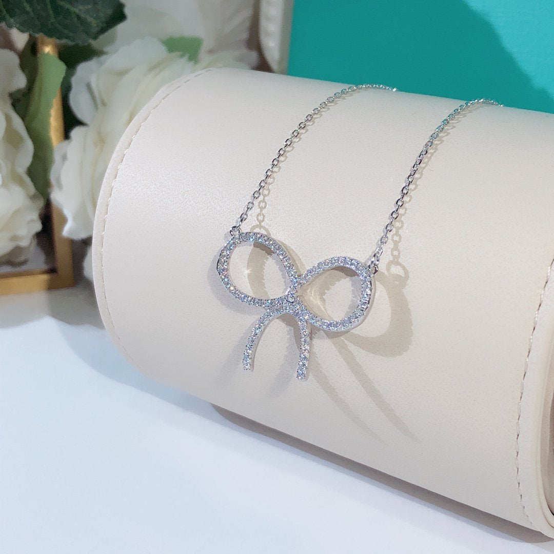[Lumi Jewelry]CLAW SET RHODIUM PLATED BOW NECKLACE